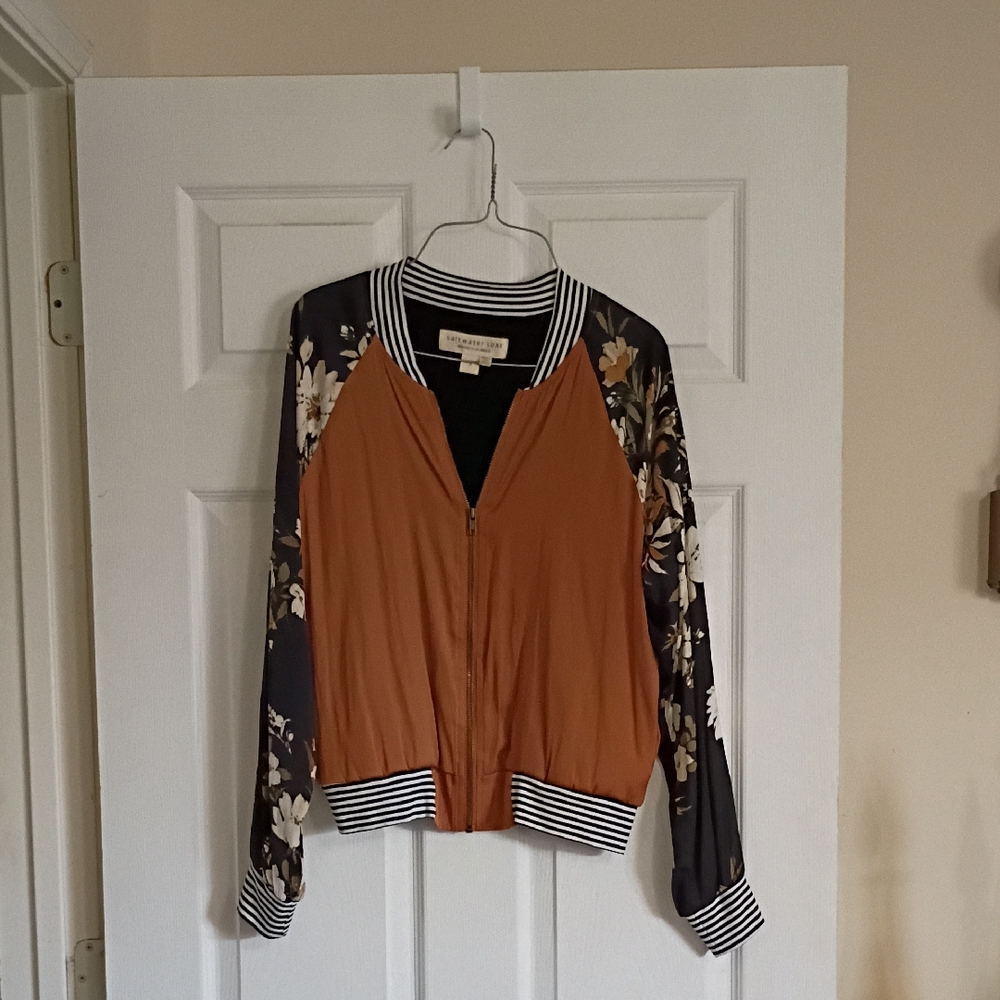 Saltwater Luxe. Rust Bomber Jacket with Floral Sleeves